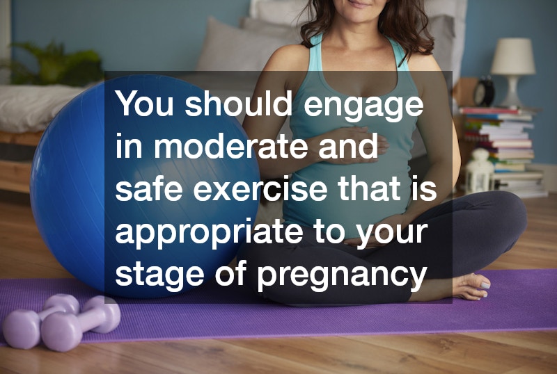 pregnant woman sitting on a yoga mat